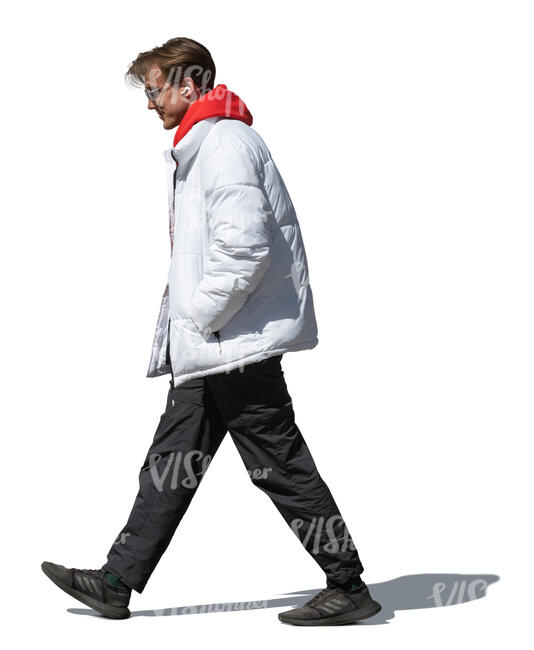 man in white puffer jacket walking