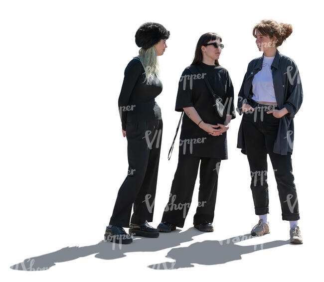 three cut out women in black standing