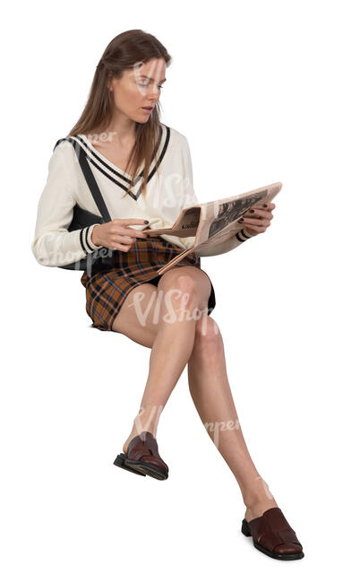 cut out woman sitting and reading a newspaper