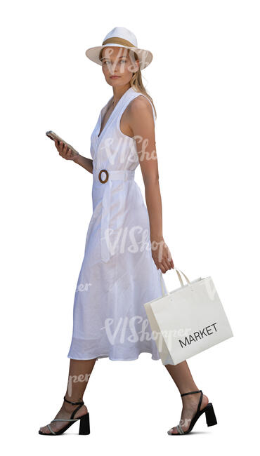 cut out chic woman in a white dress walking