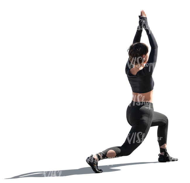 cut out backlit woman doing yoga exercises