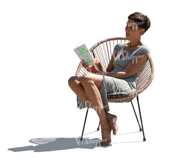 woman sitting in a balcony chair and reading