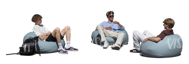 three young men sitting in bean bag chairs