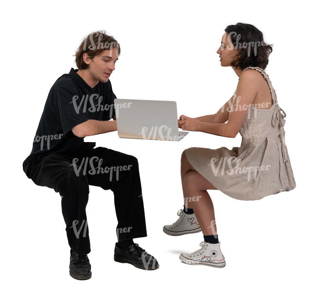 man and woman with computer discussing smth