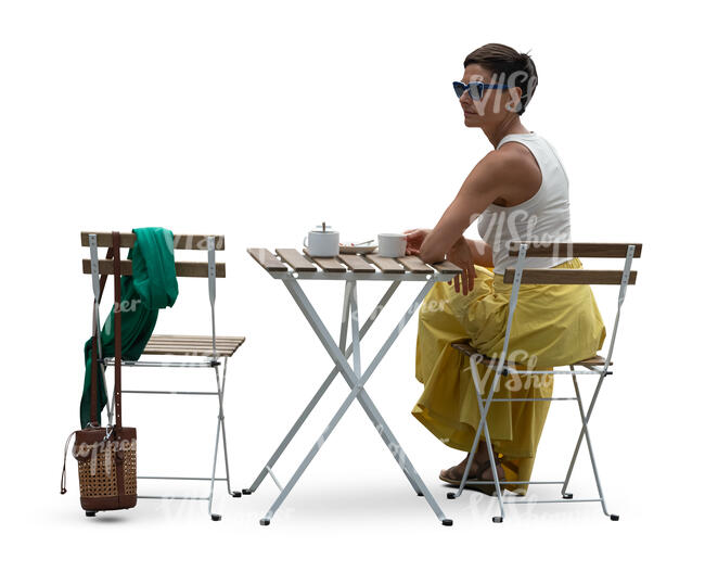 cut out woman sitting in a cafe and drinking coffee