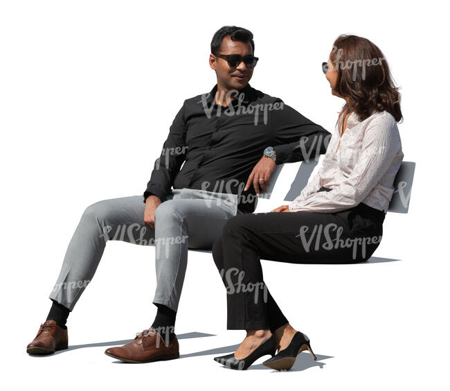 two business people sitting outside and talking