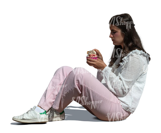 woman sitting and eating ice cream