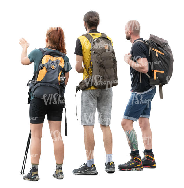 group of hikers standing and looking at a view