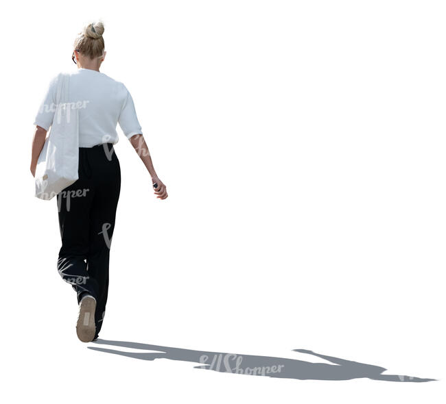 backlit woman walking