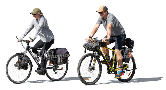 two people traveling on bikes