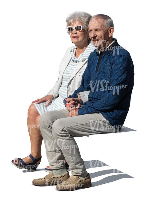 grey haired couple sitting