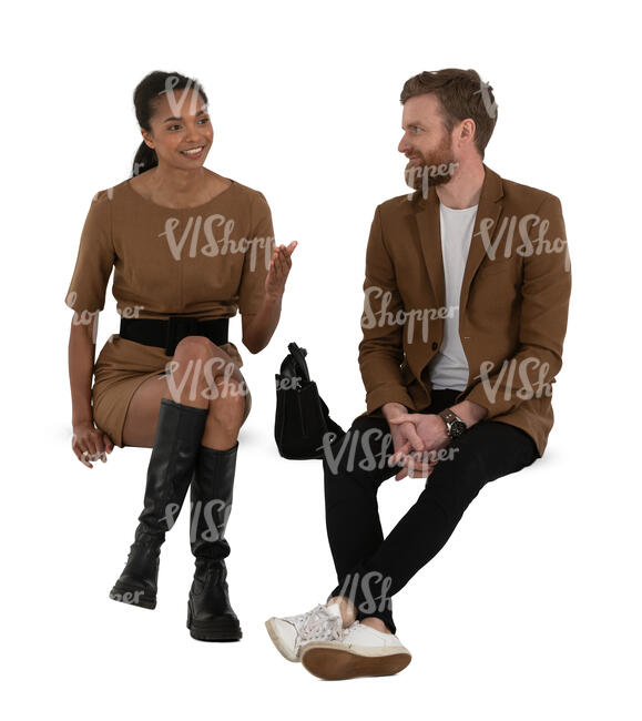 two cut out people sitting and having a conversation