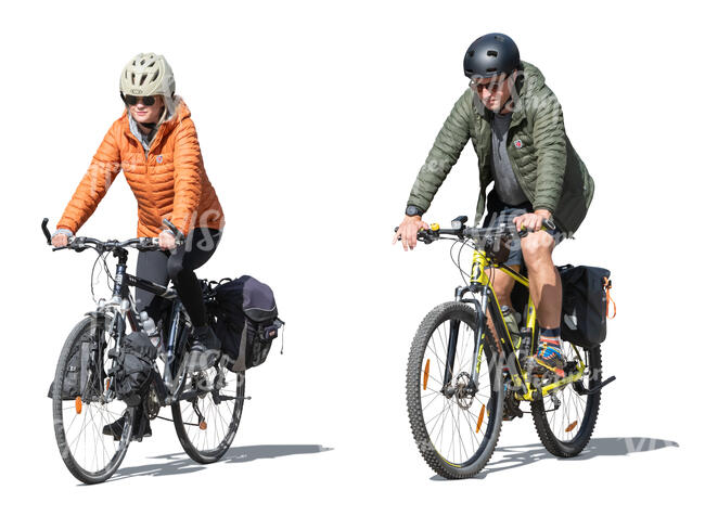 two sporty bikers travelling on bicycles