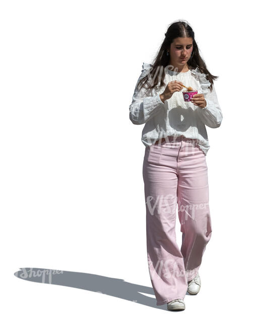 cut out woman walking and eating ice cream