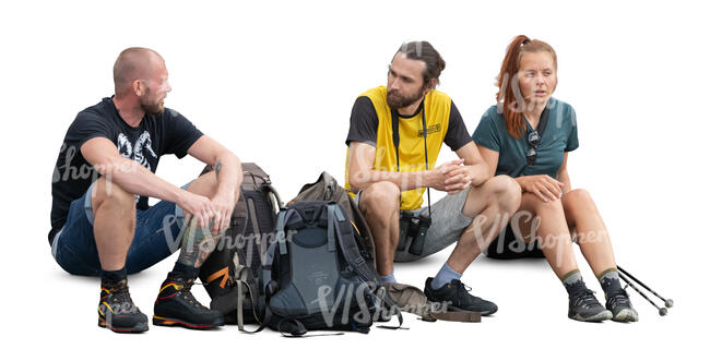 group of sporty hikers sitting and resting