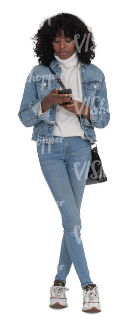 cut out young black woman standing and texting