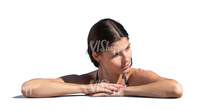 woman leaning on the edge of the swimming pool