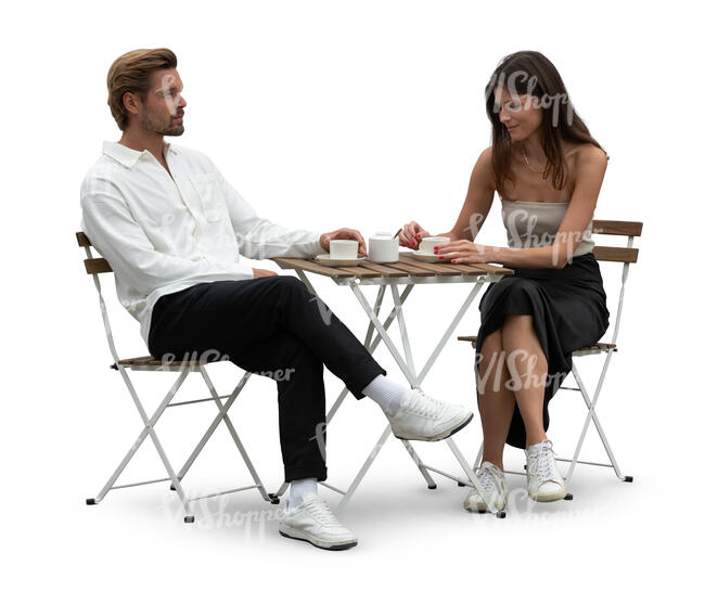 couple sitting in a restaurant and drinking coffee