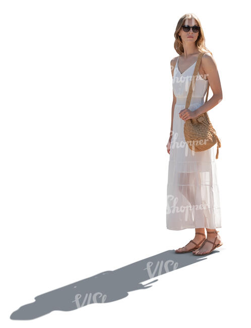 cut out backlit woman in a white summer dress standing