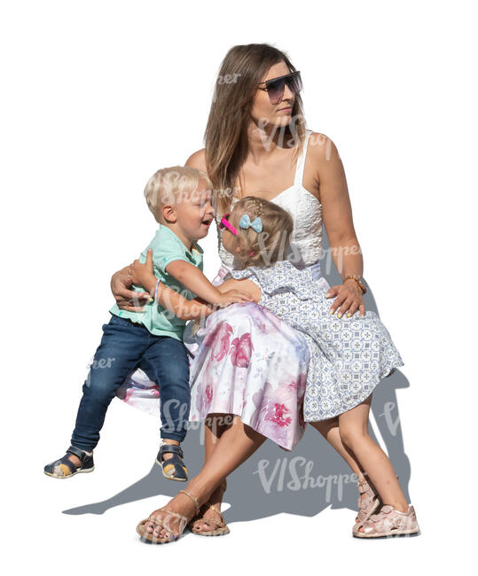 woman with two little kids sitting