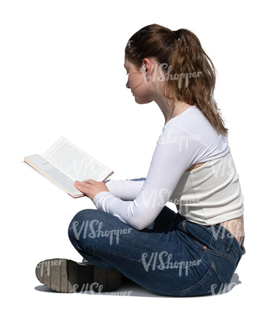 cut out woman sitting on the ground and reading a book