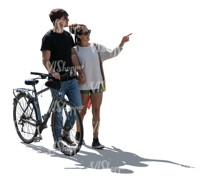 cut out backlit couple with a bike walking hand in hand