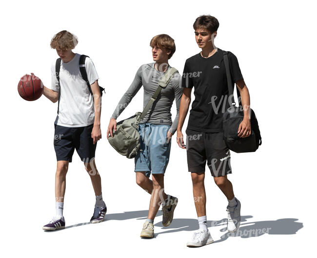 three boys with basketball walking