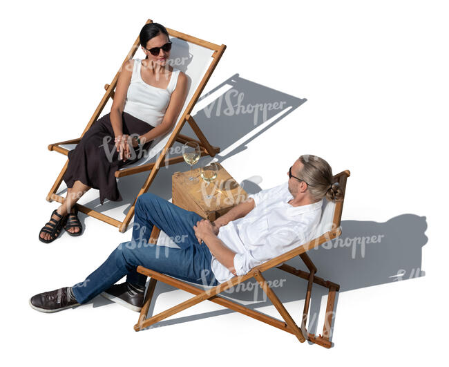 top view of a couple relaxing in sling chairs outside