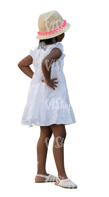 little black girl in a white dress standing