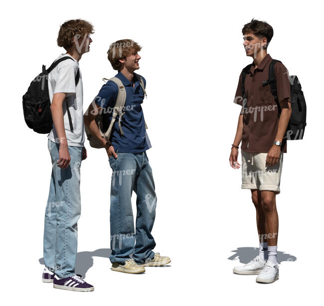 group of three teenage boys standing and talking