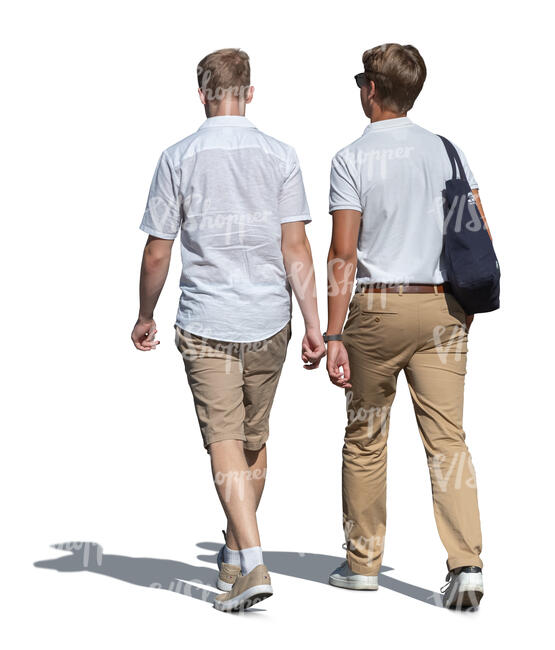 two young men walking in the summer