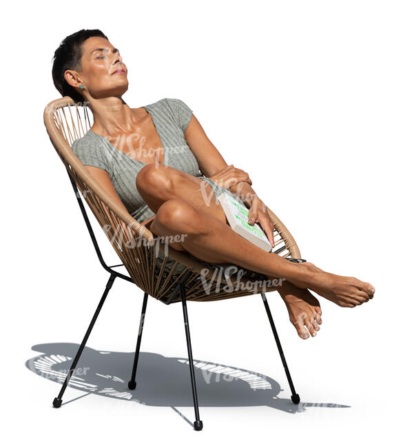 woman relaxing outside in a patio chair