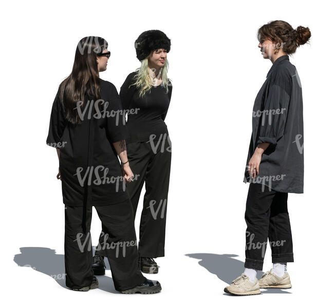 three cut out women in black standing and talking