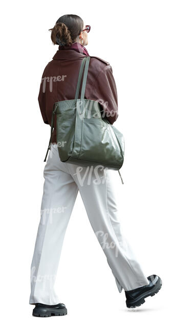 woman in white trousers walking