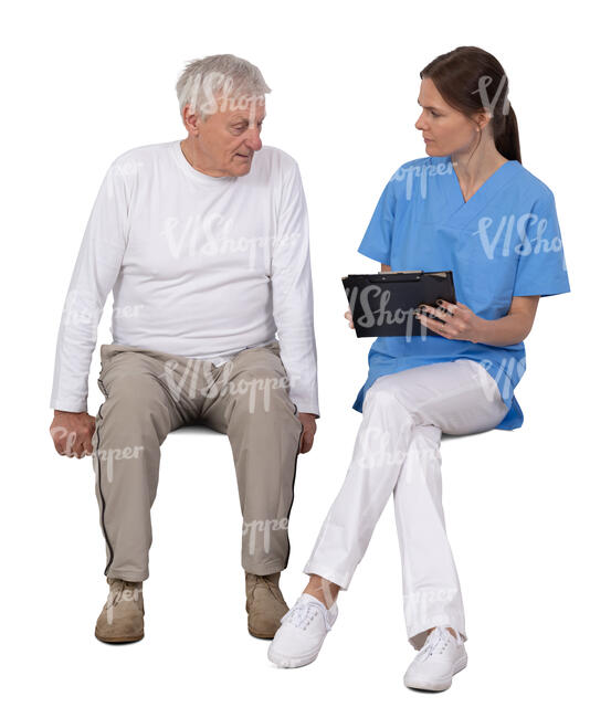 elderly man sitting and talking with a doctor