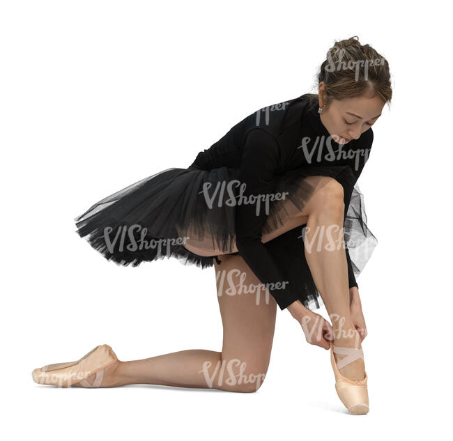 asian ballerina in a black dress preparing for dance