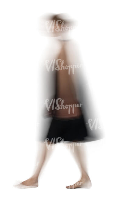 motion blur image of a woman in a black dress walking