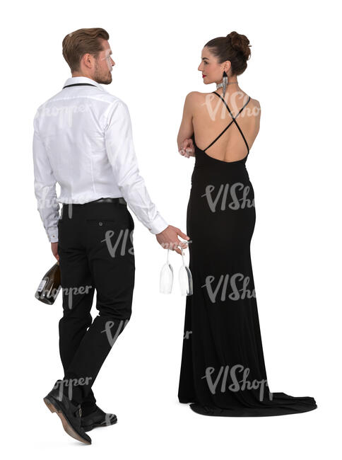 man and woman at a party going to drink champagne