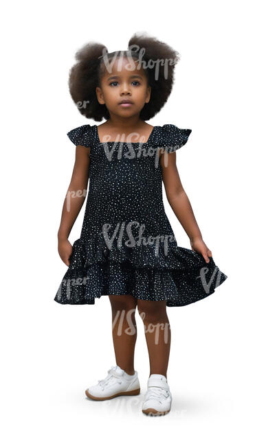 little girl in a dress standing