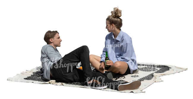 two young people having a picnic