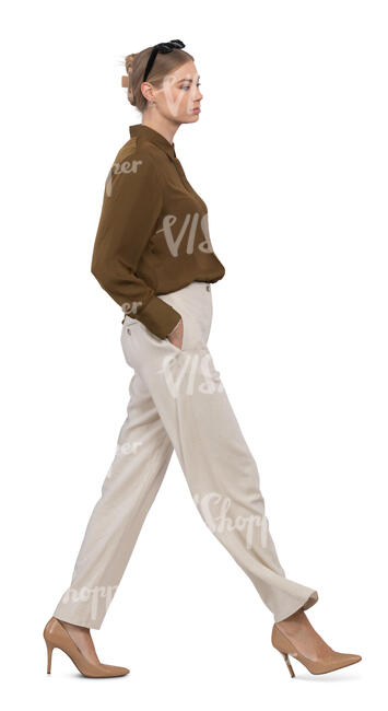 cut out woman walking hands in pockets