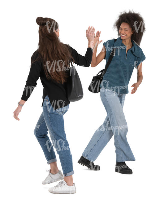 two women walking ad saying goodbye in the street