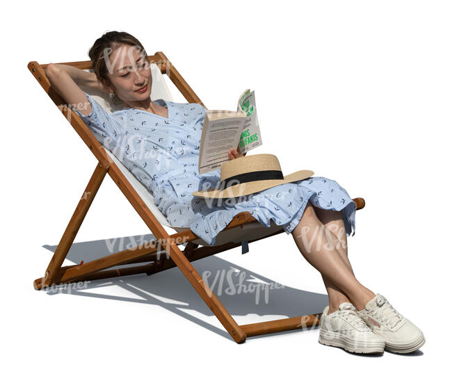 woman relaxing in a garden chair outside and reading a book