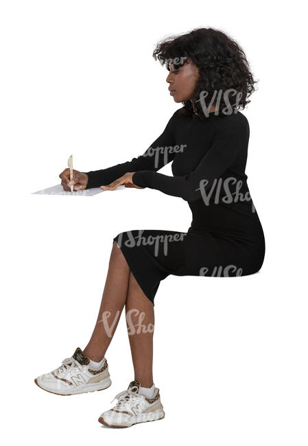 cut out woman in a black dress sitting at a desk and writing