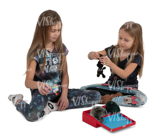 two cut out little girls playing on the floor