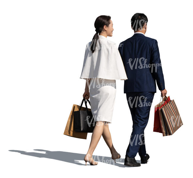 cut out asian couple with shopping bags walking