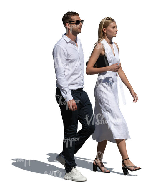 chic young couple in white walking in summer