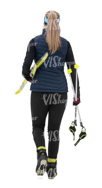 cut out woman with skis going skiing