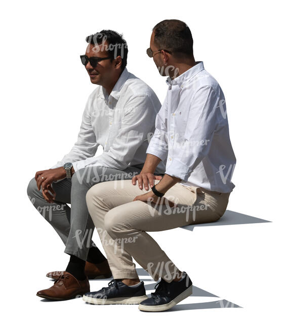 two cut out office workers sitting outside