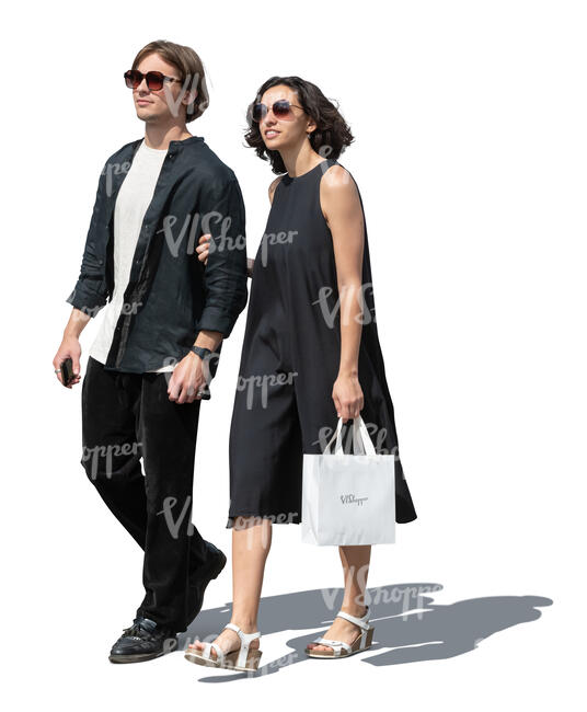 young and chic couple coming from shopping